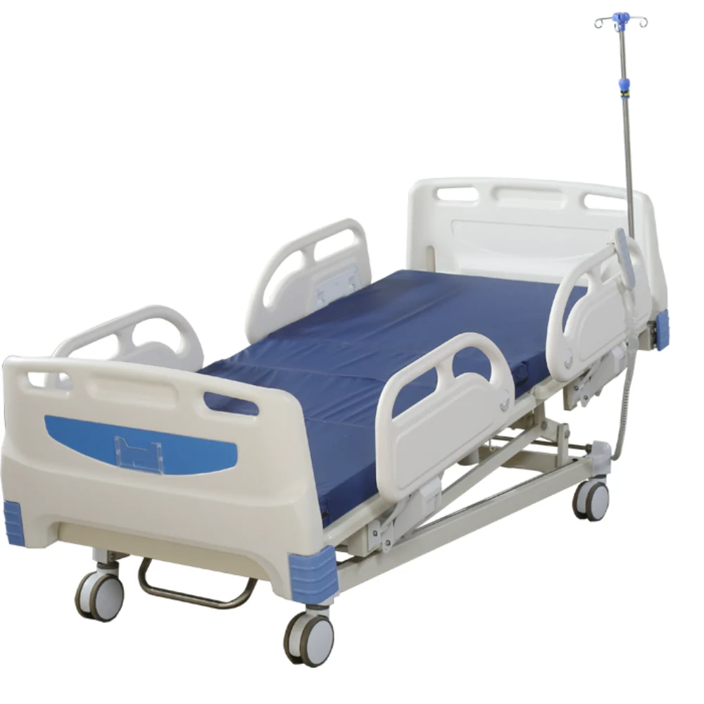 adjustable-medical-bed-night-mode-underbed-storage Electric hospital bed in low position (45cm) with backlight remote, underbed storage tray, and 3-zone pressure relief mattress in home-care setting.